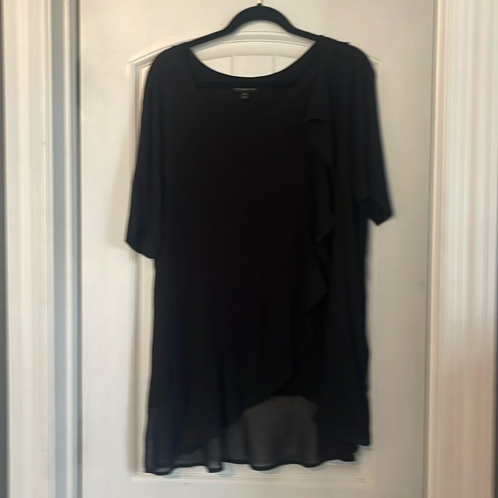 Black flowy with see through ruffles. Size 18/20